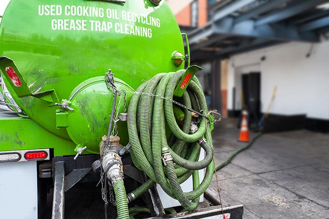 Grease Trap Cleaning of Watertown workers